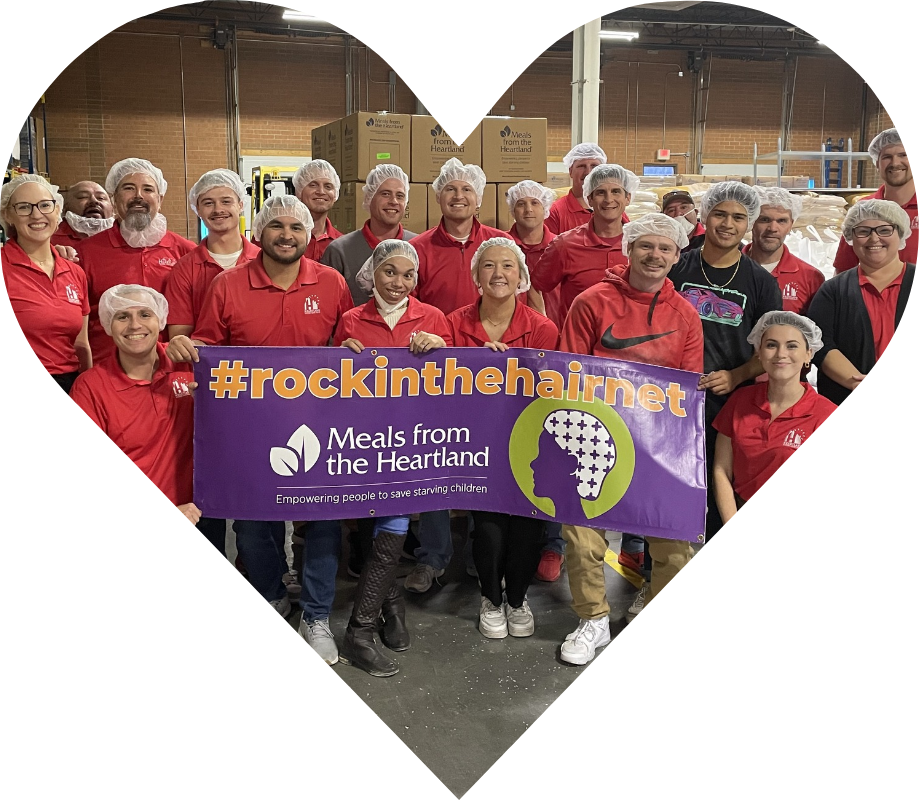 Heartland team volunteering at meals from the heartland